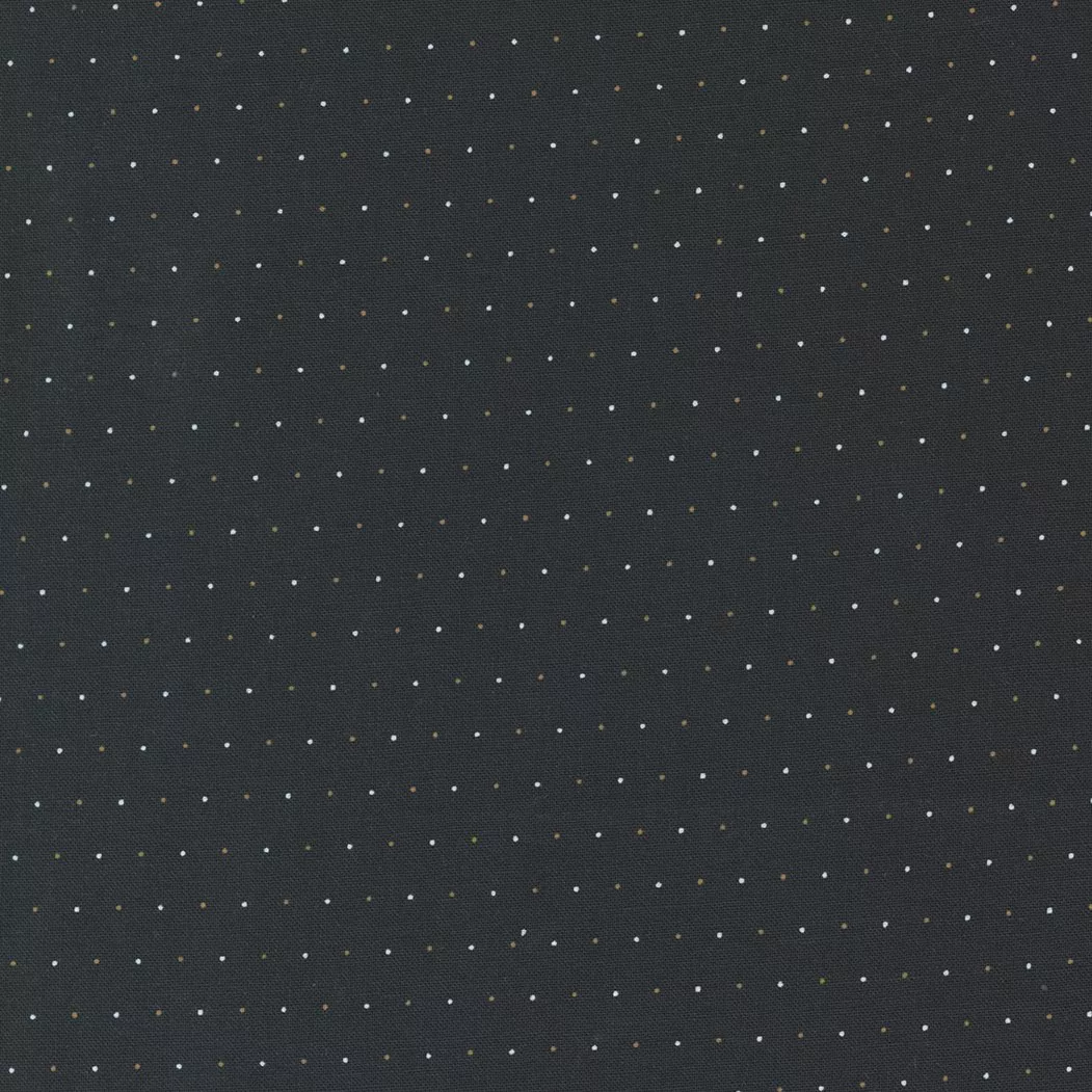 Moda Rustic Gatherings.Amber and white pin dotted lines on a black colored background.